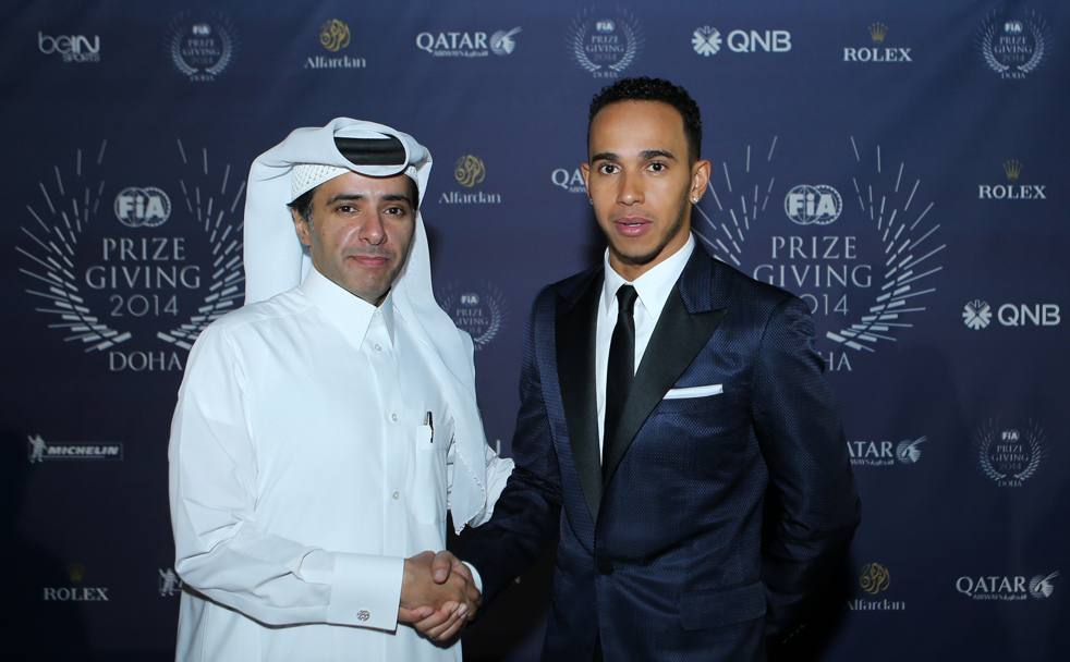 Giornata di premiazioni a Doha, Qatar: la Federazione internazionale dell&#39;auto assegna i riconoscimenti ai campioni della stagione 2014. Ecco Lewis Hamilton all&#39;arrivo. Afp